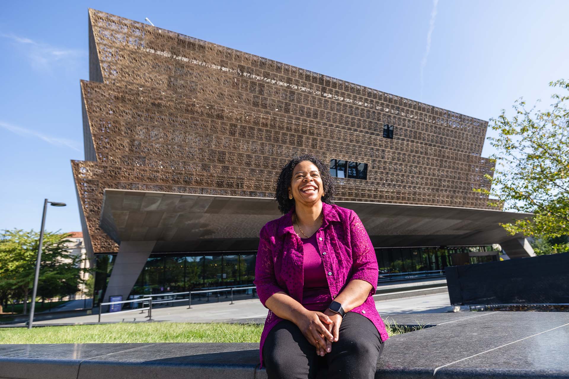 Dawn Mann Sanders in front of the National Museum of African American History and Culture | Christian Author and Motivational Speaker | Biblical Relationship Advice